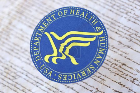 Photo for KYIV, UKRAINE - MARCH 9, 2024 US Department of Health and human Services seal on United States Constitution close up - Royalty Free Image