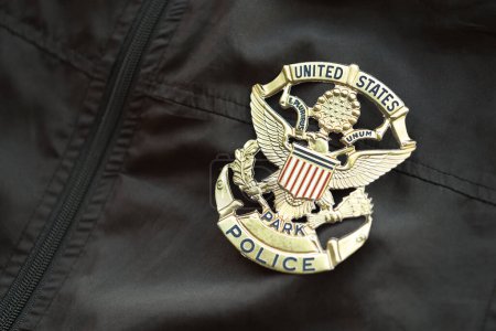 Foto de KYIV, UCRANIA - 9 DE MARZO DE 2024 US United States Park Police badge on black jacket uniform close up - Imagen libre de derechos