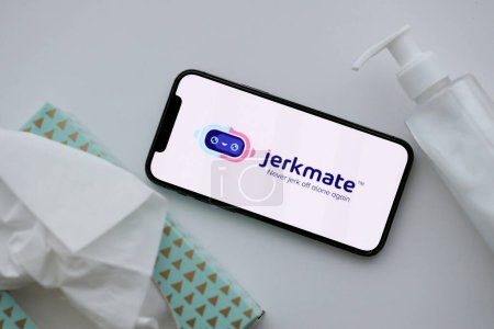 Photo for KYIV, UKRAINE - JANUARY 23, 2024 JerkMate adult content website logo on display of iPhone 12 Pro smartphone - Royalty Free Image