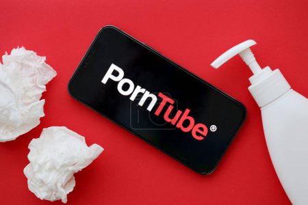 Photo for KYIV, UKRAINE - JANUARY 23, 2024 PornTube adult content website logo on display of iPhone 12 Pro smartphone - Royalty Free Image