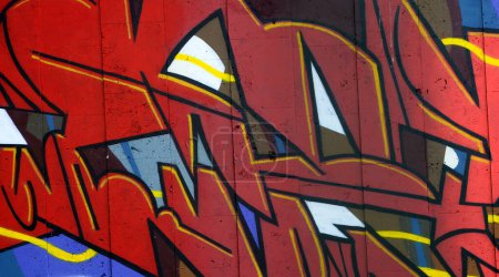Photo for Colorful background of graffiti painting artwork with bright aerosol outlines on wall. Old school street art piece made with aerosol spray paint cans. Contemporary youth culture backdrop - Royalty Free Image