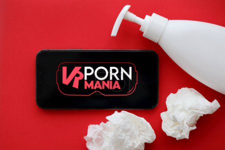 Photo for KYIV, UKRAINE - JANUARY 23, 2024 VRPornMania adult content website logo on display of iPhone 12 Pro smartphone - Royalty Free Image