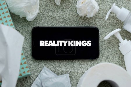 Photo for KYIV, UKRAINE - JANUARY 23, 2024 RealityKings adult content website logo on display of iPhone 12 Pro smartphone - Royalty Free Image