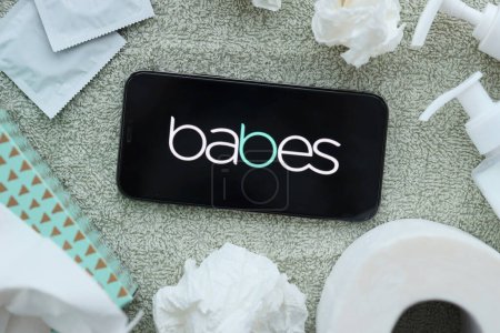 Photo for KYIV, UKRAINE - JANUARY 23, 2024 Babes adult content website logo on display of iPhone 12 Pro smartphone - Royalty Free Image