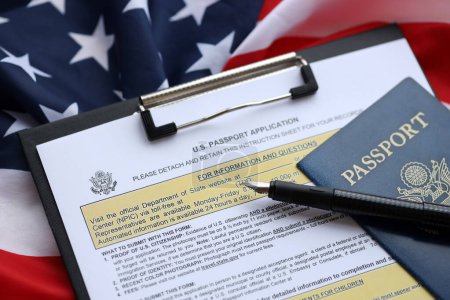 Photo for Department of State form DS11 Application for a U.S. Passport lies on table and ready to fill close up. Paperwork during operations with US Passport concept - Royalty Free Image