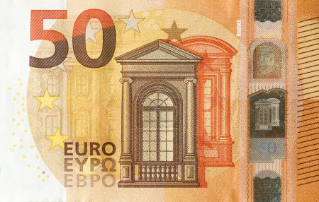 Photo for Fragment of one fifty euro money bill. Details of European union currency banknote of 50 euro close up - Royalty Free Image