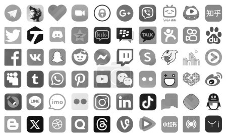 Téléchargez les photos : KYIV, UKRAINE - 1er AVRIL 2024 De nombreuses icônes des médias sociaux, messagers, plateformes de partage vidéo et autres services populaires et sites Web imprimés sur papier blanc en couleur grise - en image libre de droit
