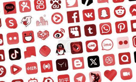Foto de KYIV, UCRANIA - 1 DE ABRIL DE 2024 Muchos iconos de las redes sociales, mensajeros, plataformas para compartir videos y otros servicios populares y sitios web impresos en papel blanco en color rojo - Imagen libre de derechos