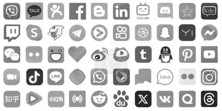 Téléchargez les photos : KYIV, UKRAINE - 1er AVRIL 2024 De nombreuses icônes des médias sociaux populaires, messagers, plates-formes de partage vidéo et autres services smartphone imprimés sur papier blanc en couleur grise - en image libre de droit