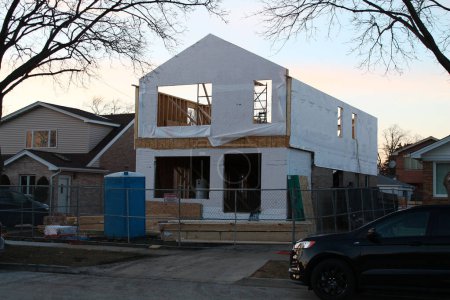 two-story house being constructed, new build