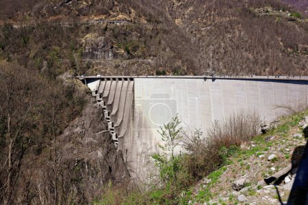 Photo for The huge Verzasca Dam is 220 meters high in the Val Verzasca, Gordola, Ticino in Switzerland - Royalty Free Image