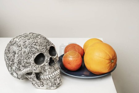 A skull in need of vitamins on a white shelf