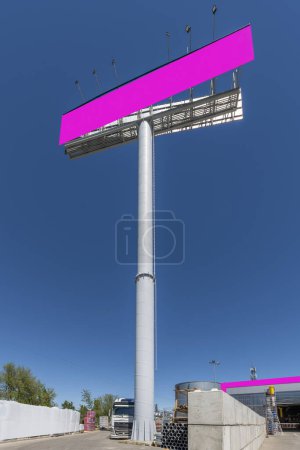 Advertising banner outside a shopping center with marked spaces