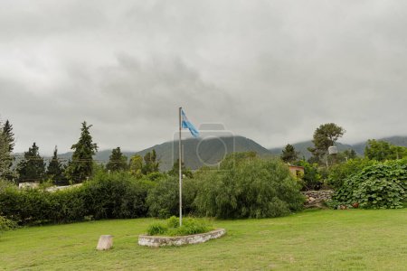 Argentine flag in the Los Menhires archaeological reserve located in the town of El Mollar in Tucuman.