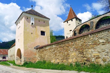  Defensive walls and two towers built on different levels of the fortified church of Biertan.