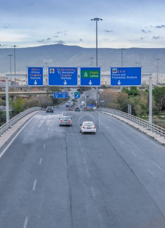 Photo for A highway road in athens - greece with sign directions (vertical) - Royalty Free Image