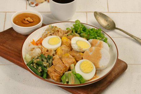 Photo for Gado Gado Indonesian Mix Vegetables Salad From Boiled or Steam Vegetable Served with Peanut Sauce. - Royalty Free Image
