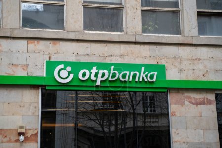 Photo for Otp Banka sign and logo on Knez Mihailova Street. OTP Banka Srbija formerly known as Vojvoanska banka, is a bank operating in Serbia. Belgrade, Serbia - March 31, 2023. - Royalty Free Image