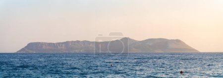 Photo for Panoramic view of Kastellorizo Island from Kas district. Castellorizo, officially Megisti is a Greek island and municipality of the Dodecanese in the Eastern Mediterranean. - Royalty Free Image