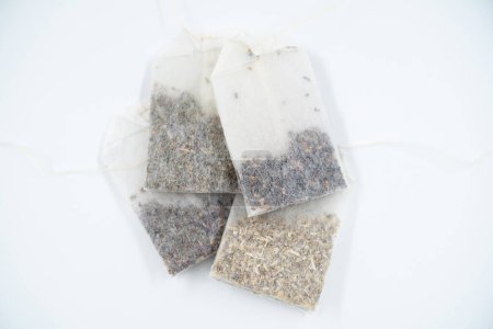 Herbal teas in bags isolated on white background.