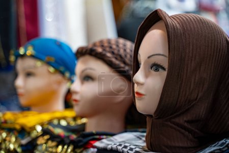 Headscarves on a lifeless mannequin.