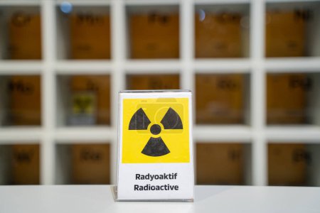 Radioactive warning icon in laboratory.