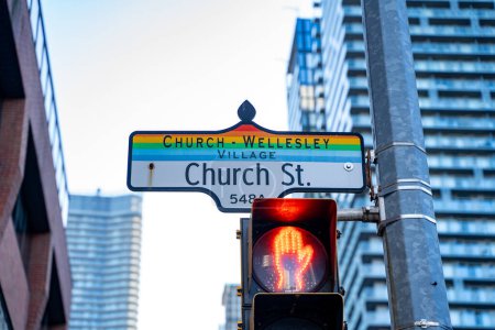 A street sign for Church Street with the rainbow color scheme indicating a street in the Church Wellesley gay village in Toronto.