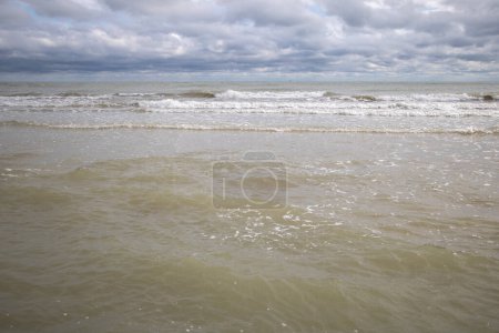 Photo for Seascape with waves on the Rimini beach in Italy. - Royalty Free Image