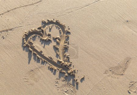 Photo for Heart drawn in sand on the beach. Valentine's day concept. - Royalty Free Image