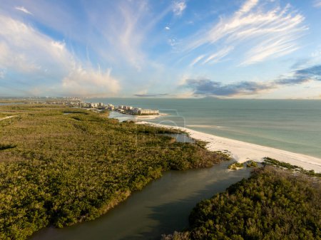 Blue sky with clouds over Bonita Beach in Florida from an aerial view in spring