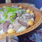 Kazakh traditional dish beshbarmak on the table.