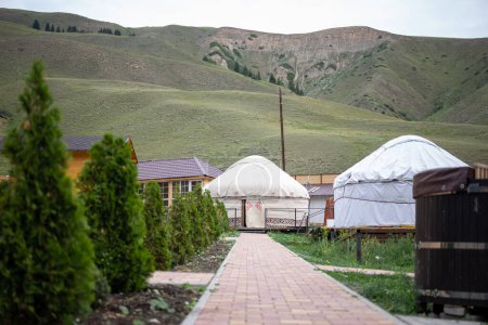 The yurt, a nomadic tent of Central Asia, is round, made of felt or skins, easy to assemble, and portable. Its a traditional dwelling.