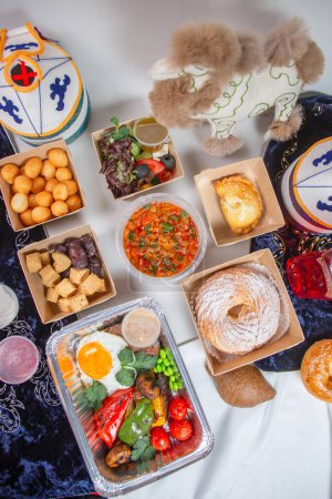 Indulge in the rich and vibrant flavors of Uzbek cuisine. This top view presentation captures the essence of Central Asian food culture.