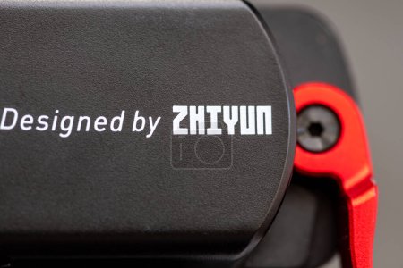 Foto de London. UK- 02.01.2023. Close up of a Zhiyun handheld gimbal showing the company name, trademark. - Imagen libre de derechos
