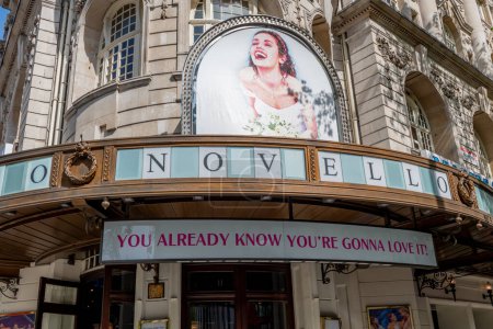 Photo for London. UK- 05.17.2023.The name sign and facade of the Novello Theatre in Aldwych with an advertisement for the musical Mama Mia! - Royalty Free Image