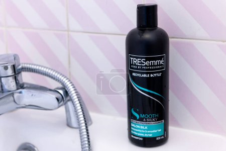 Photo for London. UK- 05.21.2023. A bottle of TRESemme shampoo on a bath tub. - Royalty Free Image
