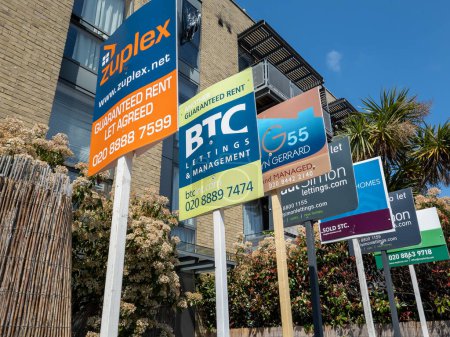 Photo for London. UK- 05.24.2023. A row of apartment to let sign from a number of estate agents outside a block of flats. - Royalty Free Image