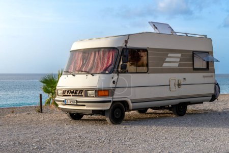 Photo for Lefkada island. Greece- 10.23.2023. A old Hymer camper van on Kathisma Beach. - Royalty Free Image