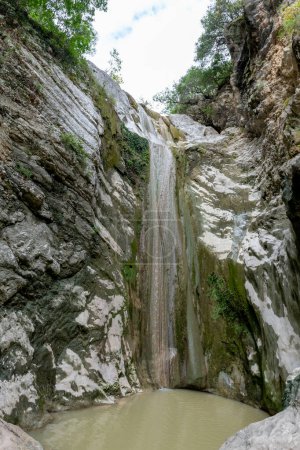 The Nydri Waterfall during the dry season with little water falling. Lefkada island. Greece.