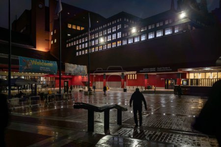 Photo for London. UK- 01.23.2024. Exterior night view of the facade and entrance of the British Library in Euston. - Royalty Free Image