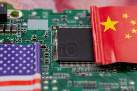 A technology political economic concept with the Chinese and American national flag a semi conductors circuit board.