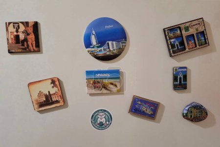Photo for Magnets brought from travels, glued to the refrigerator - Royalty Free Image