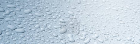 Téléchargez les photos : Water drops on gray and blue surface - en image libre de droit
