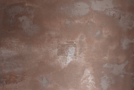 Téléchargez les photos : Beige gypsum plaster texture of wet wall as background - en image libre de droit