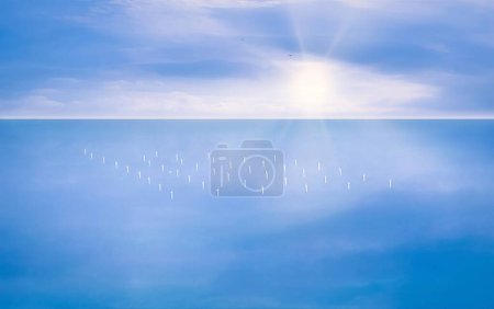 Téléchargez les photos : Une vue aérienne d'un champ d'éoliennes en mer près de la côte - en image libre de droit