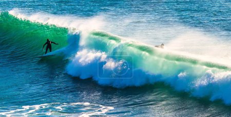 Photo for Santa Cruz, United States - January 27 , 2013 : Surf capitol off the US. Only the bravest surfest dare to ride these waves. - Royalty Free Image