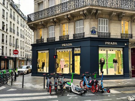 Photo for Paris, France - April 11 2023: the brand of Prada hangs above a store selling luxurious clothing and goods - Royalty Free Image
