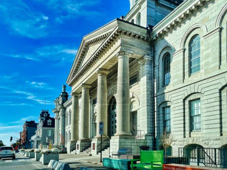 Photo for Kingston, canada - 23 October 2022: columns at the entrance facade of the historic architectural city hall building of the city - Royalty Free Image