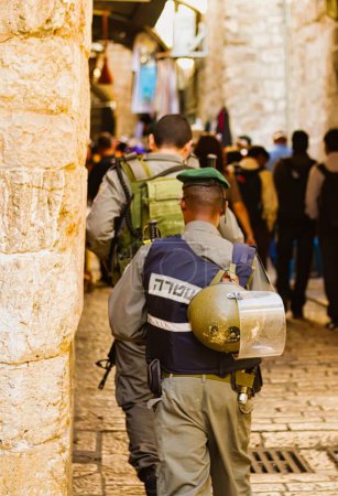 Photo for Jerusalem, Israel - November 12 2010 : a patrol of two israeli soldiers in the busy old town of Jerusalem - Royalty Free Image