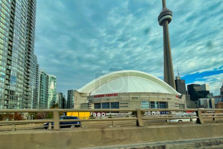 Photo for Rogers centre dome and the famous landmark the cn tower next to it - Royalty Free Image